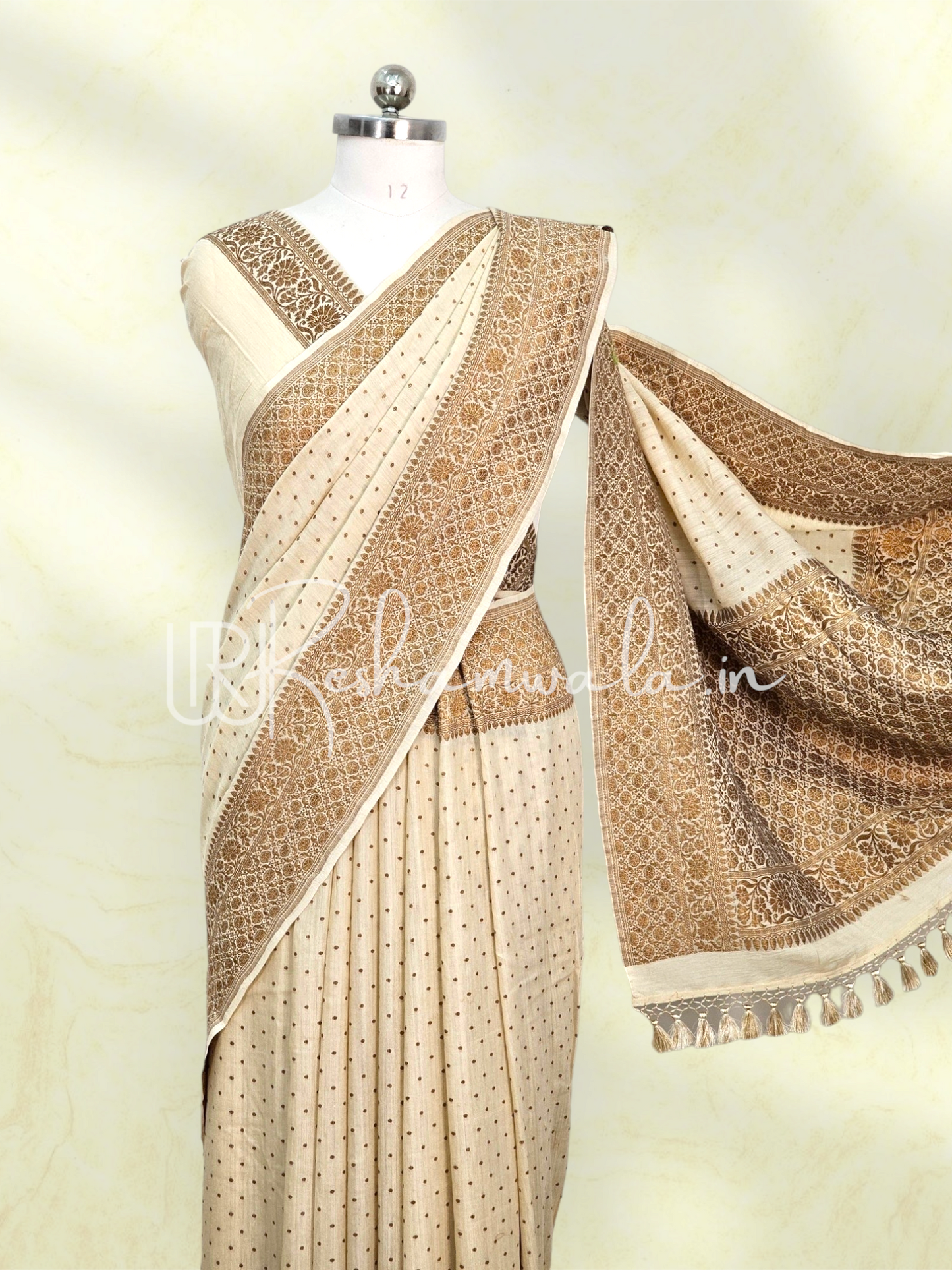 Handwoven Banarasi Pure Munga Silk Saree with antique zari work and heavy tassels with sleeves in blouse