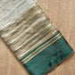 Pure Metallic Tissue Silk stripe saree with Katan silk border and special tassels with blouse sleeves - Resham Wala