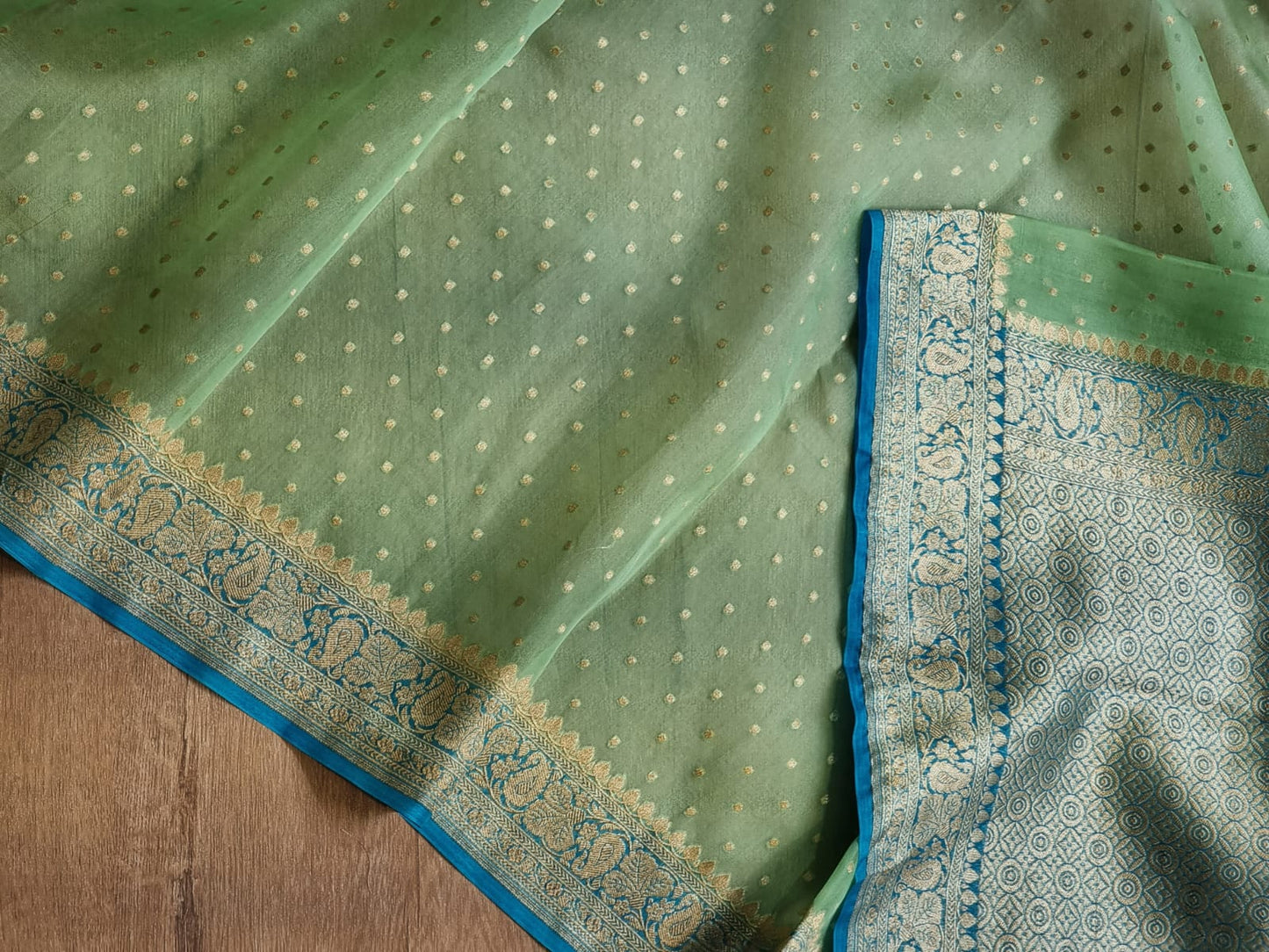 Handwoven Banarasi Pure Kora Silk Saree with contrast border Pallu and blouse with special tassels
